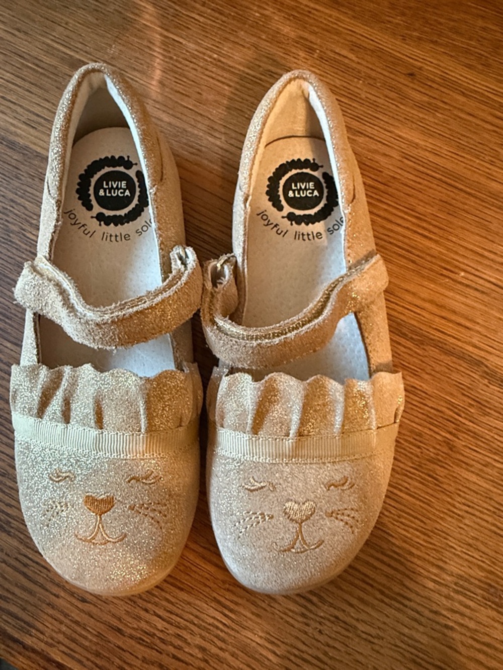 Livie & Luca Girls' Gold Sparkle Mary Janes with Cat Face and Ruffle